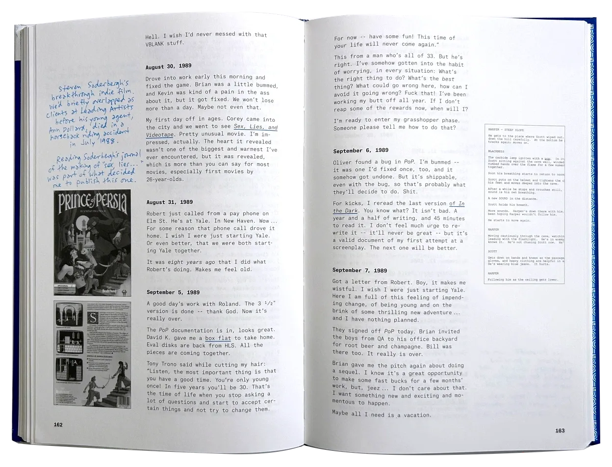 An open copy of The Making of Prince of Persia, with journal entries, blue handwritten notes, and illustrations