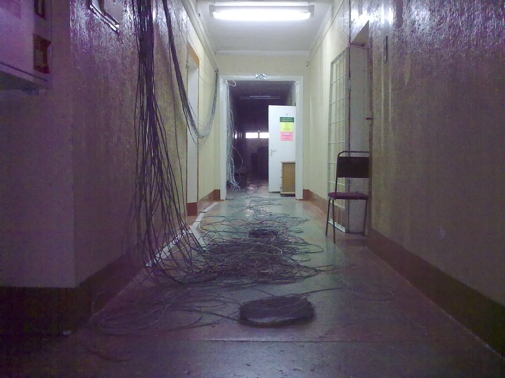 Long hall with tangled LAN cables