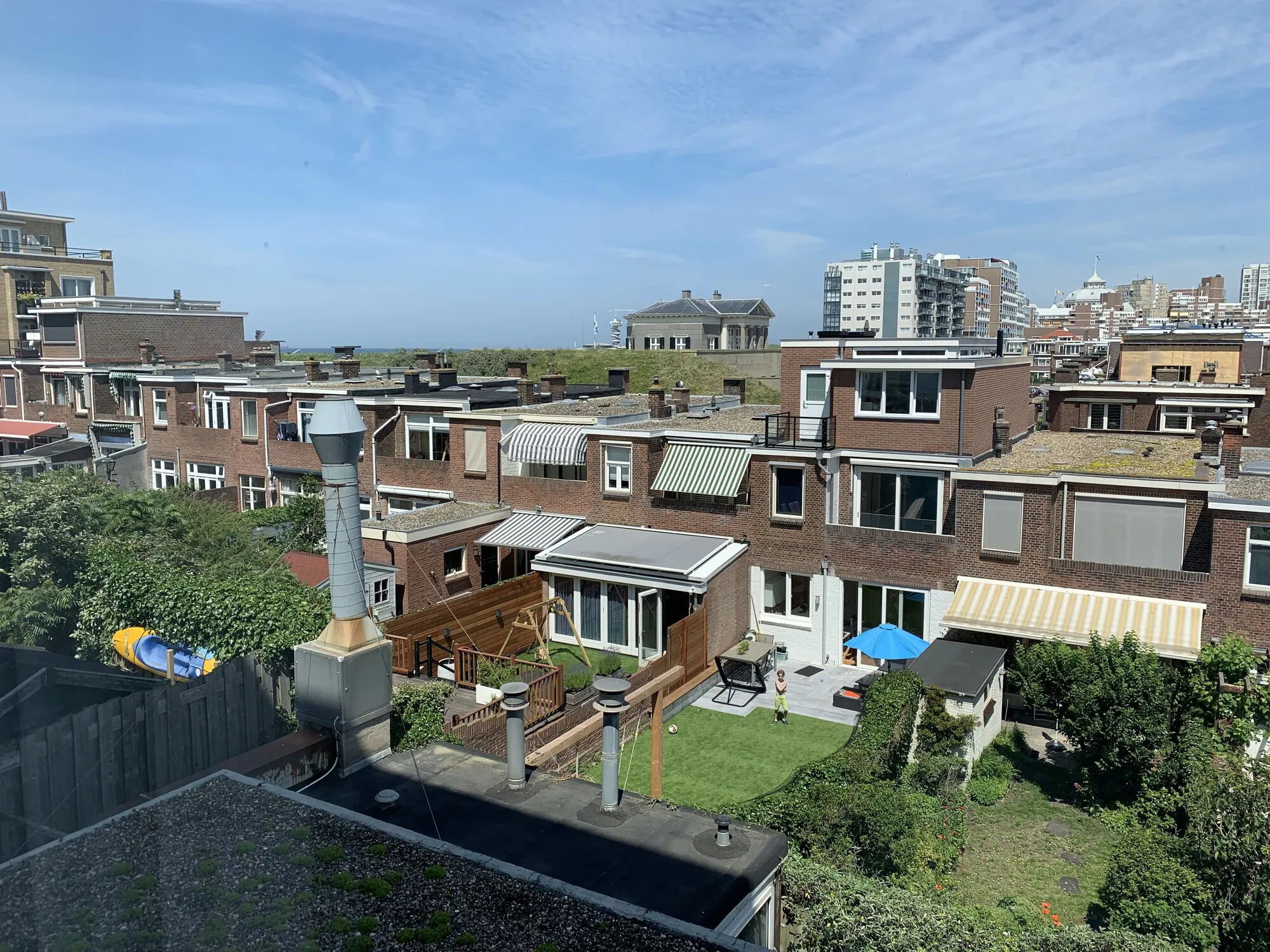 Private backyards with different stuff: summer tables, lawn, swing for kinds,etc